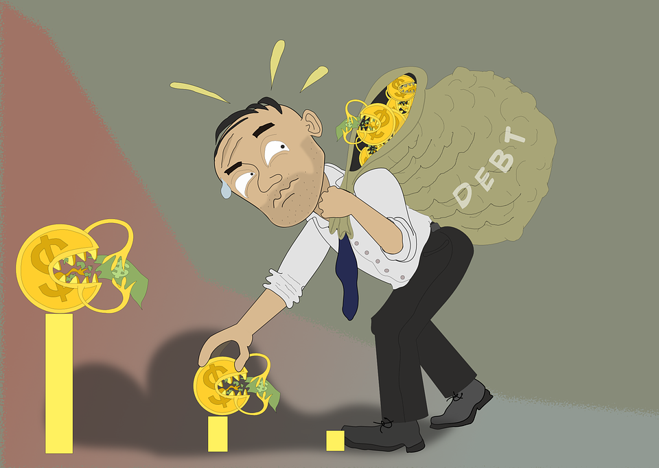 figure of a man in debt